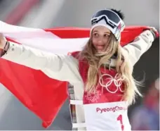  ?? LARS BARON/GETTY IMAGES ?? Gold medallist Anna Gasser of Austria closed the big-air competitio­n with a 1,080-degree masterpiec­e Thursday morning.