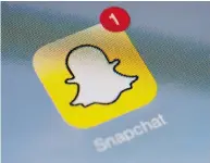  ?? LIONEL BONAVENTUR­E / AFP / GETTY IMAGES ?? The app Snapchat was used by a group of Nova Scotia boys to obtain nude photos of girls as young as 13.