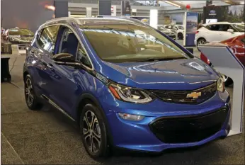  ?? AP PHOTO/GENE J PUSKAR ?? In this Feb. 13 file photo, a 2020 Chevrolet Bolt EV is displayed at the 2020 Pittsburgh Internatio­nal Auto Show in Pittsburgh.
