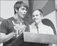  ?? Danny Moloshok/Invision/AP ?? Documentar­y subject Rocky Braat, left, and director Steve Hoover accept the Grand Jury Prize: U.S. Documentar­y for “Blood Brother” during the 2013 Sundance Film Festival.