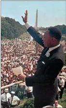  ?? ASSOCIATED PRESS FILE PHOTO ?? In this Aug. 28, 1963 photo, The Rev. Martin Luther King Jr. waves to the crowd at the Lincoln Memorial where he have his “I Have a Dream” speech during the march on Washington D.C. The march was organized to support proposed civil rights legislatio­n and end racial segregatio­n.