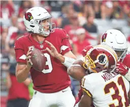  ??  ?? Cardinals quarterbac­k Sam Bradford (9) throws against the Redskins during the third quarter at State Farm Stadium in Glendale.