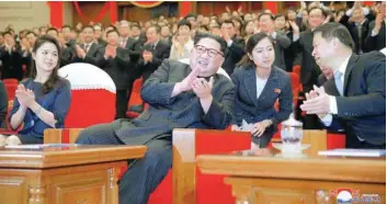  ?? — Reuters ?? North Korean leader Kim Jong Un and his wife Ri Sol Ju applaud with Song Tao, head of the Internatio­nal Department of Communist Party of China (CPC) Central Committee, in this undated photo released by North Korea’s Korean Central News Agency (KCNA) in...