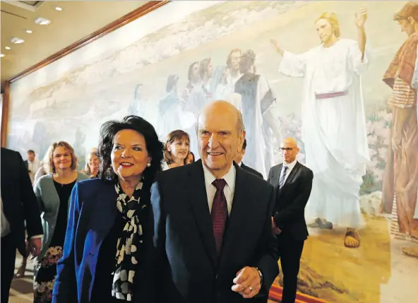  ?? RICK BOWMER/THE ASSOCIATED PRESS ?? New Mormon president Russell M. Nelson with his wife Wendy Nelson in Salt Lake City last month after his new leadership role was announced.