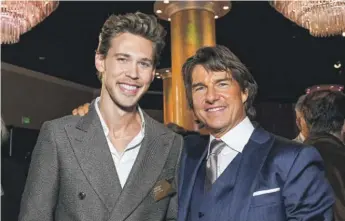  ?? VALERIE MACON/AFP VIA GETTY IMAGES ?? “Elvis” star Austin Butler and Tom Cruise at the Oscars Nominees Luncheon on Monday in Beverly Hills, California.