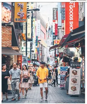  ??  ?? Myeongdong shopping street is where you’ll find an abundance of fashion, beauty and food.