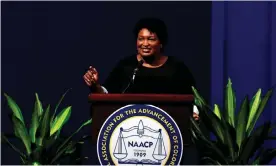  ??  ?? Stacey Abrams speaks during the NAACPs 110th national convention in Detroit. Photograph: Jeff Kowalsky/AFP/Getty Images