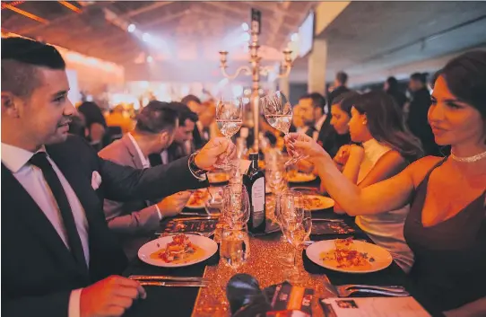  ?? PHOTOS: KAREL CHLADEK ?? Toasting the success: VIP dinner guests Maxim Benjamin and Lara Roberge raise a glass to the Casino contre le cancer benefit.