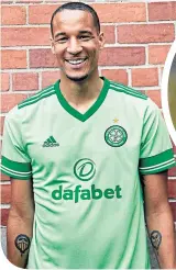  ??  ?? Jullien, in the new Celtic change strip was a big fan of Fraser Forster (inset)