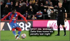  ?? ?? SPOT ON: Wilfried Zaha fires home his penalty last night