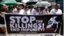  ?? - Reuters ?? ANGER SIMMERS: Relatives and loved ones of Leover Miranda, 39, a drug-related killings victim, hold a streamer calling to stop the continuing rise of killings due to the President Rodrigo Duterte’s ruthless war on drugs, during a funeral march a in...