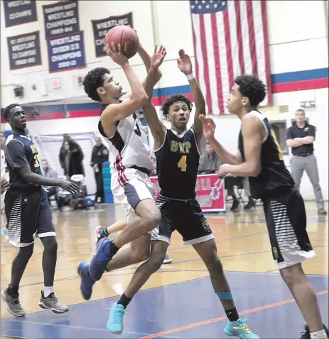  ?? Photos by Ernest A. Brown ?? Central Falls guard Luis Gonzalez (3, above) and Starlyn Mercado (24, below) led the No. 6 Warriors to a 62-55 Division III playoff victory over a Blackstone Valley Prep side that was playing in its first Interschol­astic League playoff contest.