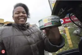  ?? BERNARD WEIL/TORONTO STAR ?? Keema Roberts holds the can of tuna tracked in the Star story.