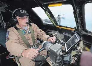  ??  ?? Pilot Steve Zimmerman flying the B-29 Superfortr­ess to Hamilton from Windsor.