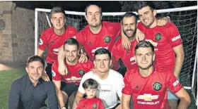  ??  ?? Proud day: Harry Maguire, in white, celebrates his move with family and friends