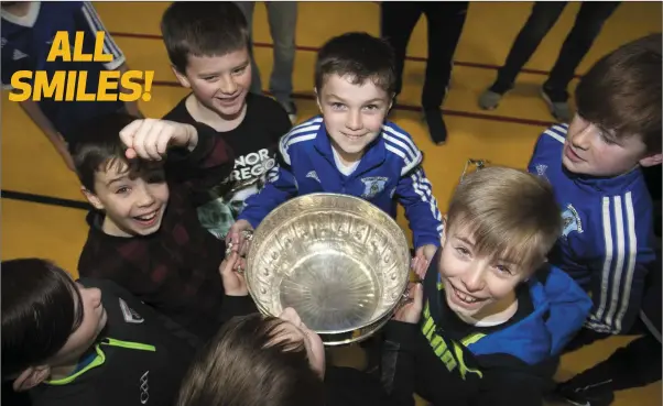  ??  ?? Aughrim GAA Club’s Mark O’Shea with the Delaney Cup at the Aughrim GAA juvenile awards last weekend. Photo: Garry O’Neill