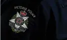  ?? Photograph: Tracey Nearmy/ AAP ?? Victoria police arrested two men linked to a neo-Nazi group and charged one after an attack on a Channel Nine security guard in Melbourne.