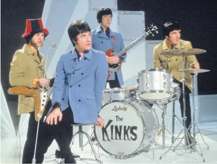  ?? HULTON ARCHIVE ?? The Kinks, from left, Dave Davies, Ray Davies, Peter Quaife, and Mick Avory, wait on the set of a television show in 1968