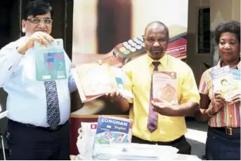  ??  ?? From   -  , IZB managing director, Maheshkuma­r Bansal, Fountain of   ope   rphanage School principal, Sichizya Nkumbu, and school home manager, Dora Changala during the donation last week.