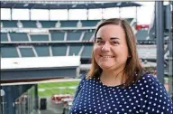  ??  ?? Katie began to lose her vision over a year ago. Now blind, she rebuilt her skills so she could still do her job in the social media department for the Atlanta Braves, which often means making games better for fans at SunTrust Park.