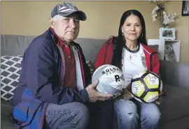  ?? Raul Roa Los Angeles Times ?? CÉSAR AND Ana Roldán will be in Qatar on Monday to watch their son Cristian play for the U.S. “It’s hard to digest,” said César, originally from Guatemala.