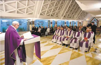  ?? Associated Press ?? Pope Francis (left) celebrates Mass on Monday at the Vatican. Tuesday marks the fifth anniversar­y of the pontiff's election since the historic resignatio­n of Pope Benedict XVI.