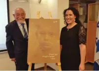  ?? (Yad Vashem) ?? YAD VASHEM’S poster competitio­n winner Tamar Boder poses proudly yesterday with her grandfathe­r, Yosef Bodner, 93, the Holocaust survivor who inspired her.