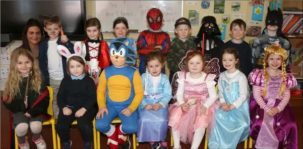  ??  ?? St Senan’s Primary School senior infant ‘B’ class pupils celebratin­g World Book Day, with teacher Sheila Murray.