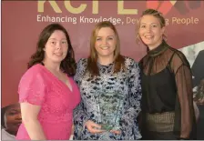  ??  ?? Mary Murphy, teacher and course co-ordinator at the KCFE (left), Joanne Roche (right) pictured presenting Mandy O’Keeffe with her Childcare Management award on Thursday.