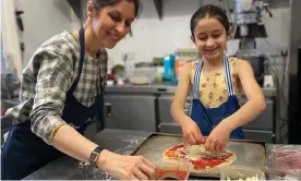  ?? ?? A picture tweeted by Tulip Siddiq of Nazanin Zaghari-Ratcliffe and her daughter, Gabriella,making pizza. Photograph: Rebecca Ratcliffe