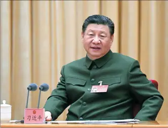  ?? LI GANG / XINHUA ?? President Xi Jinping, who is also general secretary of the Communist Party of China Central Committee and chairman of the Central Military Commission, addresses a plenary meeting of the delegation of the People’s Liberation Army and the People’s Armed Police Force at the second session of the 14th National People’s Congress in Beijing on Thursday.