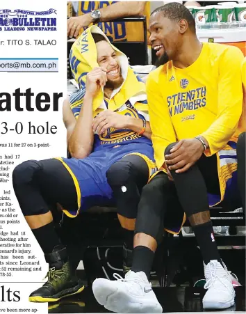  ??  ?? Golden State Warriors guard Stephen Curry, left, laughs with teammate Kevin Durant in the closing minutes of Game 3 of the NBA Western Conference finals Saturday in San Antonio. The Warriors won 120-108. (AP)