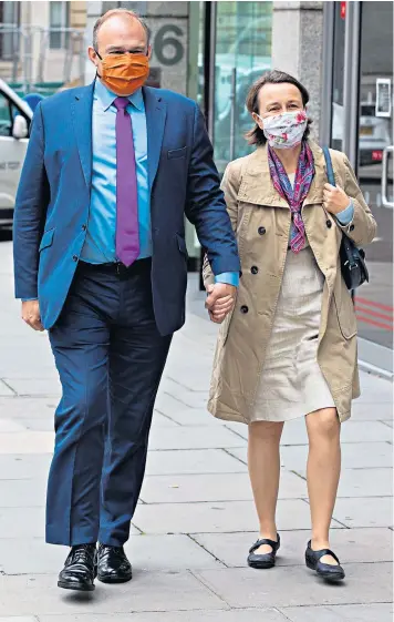  ??  ?? Sir Ed Davey and his wife Emily ahead of the leadership announceme­nt. Inset left, Layla Moran, who he beat to the top job