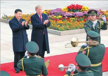  ?? WU ZHIYI / CHINA DAILY ?? President Xi Jinping holds a welcoming ceremony for visiting US President Donald Trump at the square outside the Great Hall of the People in Beijing on Thursday.