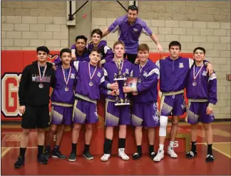  ?? Courtesy photo ?? The Valencia wrestling team placed second at the Kern County Invitation­al on Saturday. Ben Gould (center) came in first in the 195-pound weight class and was named Upper Weight MVP.