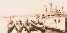  ??  ?? The RAN’s submarine depot ship HMAS Platypus with four of the J Class submarines.