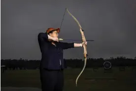  ?? Photograph: Jessica Hromas/The Guardian ?? ‘Cupid I am not’: Jennifer Wong attends her first archery class at Sydney Olympic Park Archery Centre.