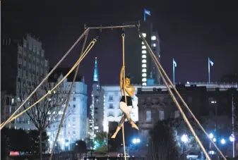  ?? Noah Berger / Special to The Chronicle ?? A member of the Santa Barbara Aerial Dance Company was among the more than 200 soloists and groups performing during the San Francisco Movement Arts Festival at Grace Cathedral.