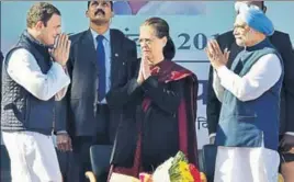  ?? PTI PHOTO ?? Newly elected Congress president Rahul Gandhi greets his mother Sonia Gandhi and former prime minister Manmohan Singh in New Delhi on Saturday.