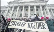  ?? THE ASSOCIATED PRESS ?? Thousands attend a women’s march at the Salt Lake City Capitol on Jan. 23, 2017. The massive women’s marches that month, primarily a backlash to Donald Trump’s election as president, served as prelude to the #MeToo movement.