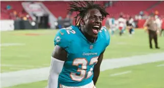  ?? PETER JONELEIT/AP ?? Dolphins safety Verone McKinley III leaves the field following a game against the Tampa Bay Buccaneers on Aug. 13 in Tampa. The Dolphins defeat the Buccaneers 26-24.