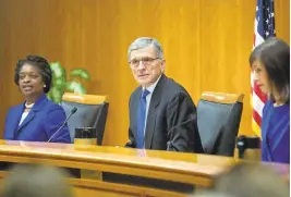  ?? PABLO MARTINEZ MONSIVAIS/ASSOCIATED PRESS ARCHIVE ?? FCC Chairman Tom Wheeler, center, led the agency as it adopted the net neutrality rules recently upheld by a federal appeals court. He lauded the decision as a ‘slam dunk.’