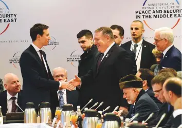  ?? AFP ?? White House US Senior Adviser Jared Kushner (left) with US Secretary of State Mike Pompeo as they arrive for the conference on Peace and Security in the Middle East in Warsaw yesterday.