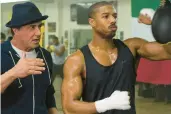  ?? WARNER BROS. PICTURES VIA AP BARRY WETCHER/ ?? Sylvester Stallone, left, as Rocky Balboa and Michael B. Jordan as Adonis Johnson in “Creed.”