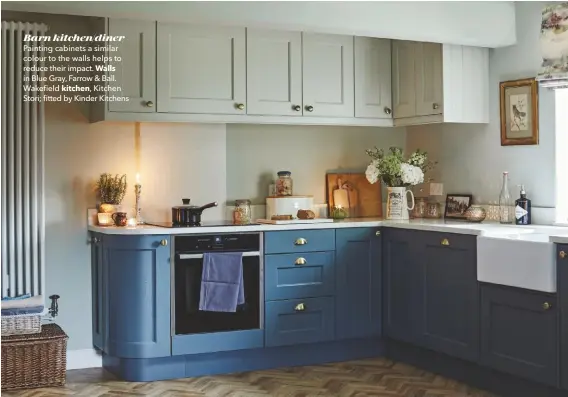  ??  ?? Barn kitchen/diner Painting cabinets a similar colour to the walls helps to reduce their impact. Walls in Blue Gray, Farrow & Ball. Wakefield kitchen, Kitchen Stori; fitted by Kinder Kitchens
