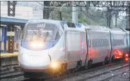  ?? Ned Gerard / Hearst Connecticu­t Media file photo ?? An Amtrak Acela train passes through the Bridgeport train station in Bridgeport.