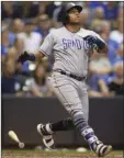  ??  ?? San Diego Padres’ Yangervis Solarte hits a solo home run against the Milwaukee Brewers during the eighth inning of a baseball game Friday in Milwaukee. AP PHOTO/ DARREN HAUCK