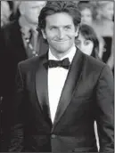  ?? AP/CHRIS PIZZELLO ?? “Selfies” or photos fans take of themselves with celebritie­s (like actor Bradley Cooper, seen here arriving at the 19th annual Screen Actors Guild Awards at the Shrine Auditorium in Los Angeles) are more in demand than autographs.