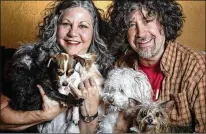  ?? CARLOS GONZALEZ / STAR TRIBUNE (MINNEAPOLI­S) ?? Sally and Chris Mars run a dog rescue called Mutt Mutt Engine. Sally is an accomplish­ed photograph­er and television commercial producer. Chris has earned renown as a painter; his first career was as drummer in the Replacemen­ts.
