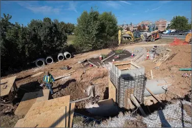  ?? NWA Democrat-Gazette/J.T. WAMPLER ?? Work continues Wednesday on a pedestrian tunnel for the Razorback Greenway under Walton Boulevard in Bentonvill­e. The tunnel should be open in the next couple of weeks.